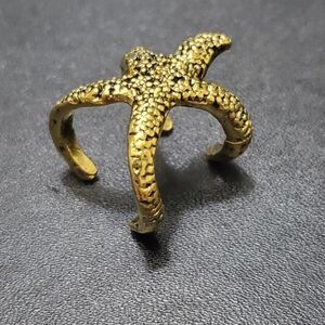 Gold tone starfish ring